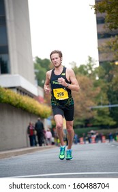 WASHINGTON - OCTOBER 27: Richard Morris, who finished third, competes in the Marine Corps Marathon on October 27, 2013 in Washington, DC