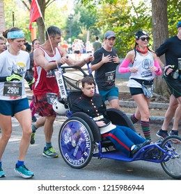 WASHINGTON OCTOBER 28: Runners compete in the Marine Corps Marathon on October 28, 2018 in Washington DC