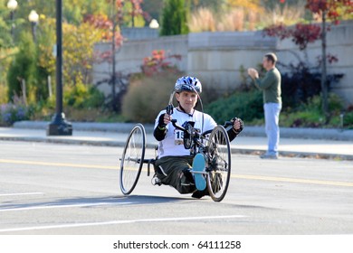 WASHINGTON- OCTOBER 31: A hand-cyclist competes in the Marine Corps Marathon on October 31, 2010 in Washington, D.C.