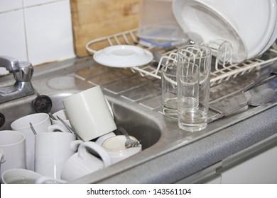 Washing-up In Office Kitchen Sink