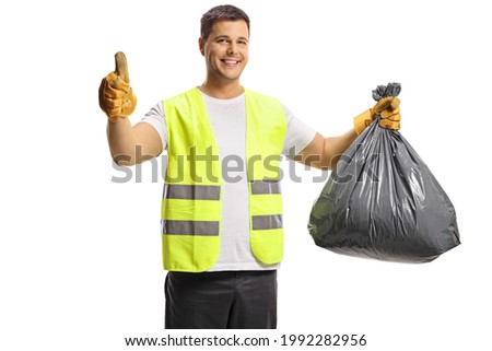 Waste collector holding a black plastic bin bag and showing thumbs up isolated on white background