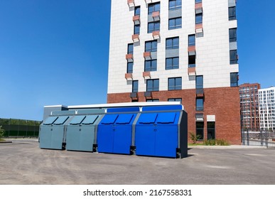 Waste Containers Near Residential Apartment Building For Separate Garbage Collection And Recycling. Eco Friendly Concept.