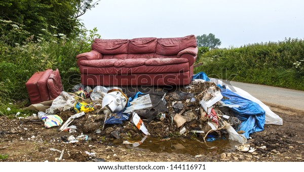  Waste dumped in\
the countryside, an illegal social issue, fly tipping causing\
environmental pollution