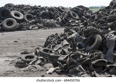 A waste heap of old tires for rubber recycling
