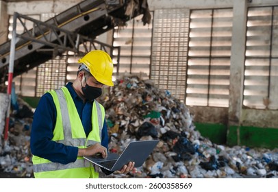 A waste management engineer in protective gear analyzes recycling operations at a landfill site, ensuring efficiency and sustainability.