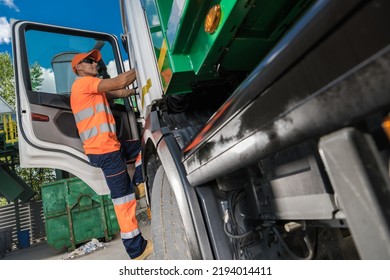 Waste Management Theme. Caucasian Garbage Truck Driver in His 40s Collecting City Garbage and Delivering to a Sorting Facility