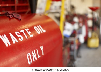 Waste Oil Container In A Mechanic's Garage.