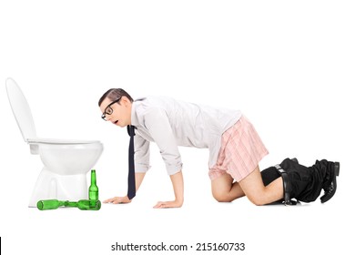 Wasted Young Man Crawling To A Toilet Isolated On White Background