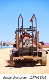 Wasteland Weekend, Near California City, California. 9-23-2016.   A Massive Dune Buggy Being Driven By A Man In A Metal Mask - Image                          