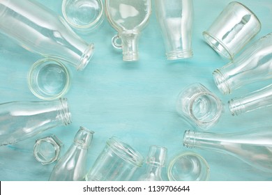Wastes of different glass containers ready for recycling. Social responsibility, ecology care concept - Shutterstock ID 1139706644