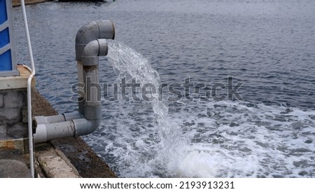 Wastewater flow from water pipe to the sea, waste water management, water management.