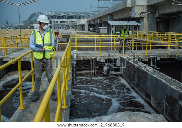 Wastewater treatment concept.\
Service engineer on  waste water Treatment plant. Wastewater\
treatment concept. Service engineer on  waste water Treatment\
plant.