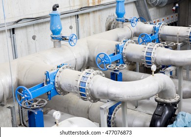 Wastewater treatment plant. A new pumping station. Valves and pipes. Urban modern treatment facilities, pipelines and pumps powerful, modern automatic system protection and control.