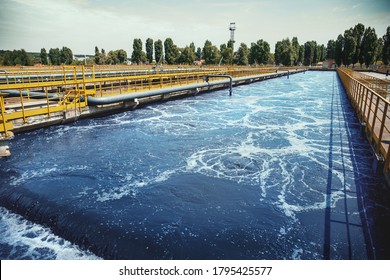 Wastewater treatment plant. Reservoir for purification of sewage. - Shutterstock ID 1795425577