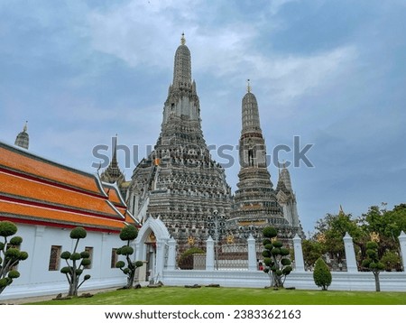 Wat Arun is a Buddhist temple in Bankok, Thailand. The temple derives its name from the Hindu god Aruna, often personified as the radiation of the rising sun.