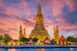 Wat Arun Temple Bangkok During Sunset In Thailand. Chao Praya River