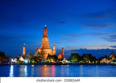 Wat Arun Is A Very Beautiful Buddhism Architecture Pagoda At Night Skyline In Bangkok, Thailand 