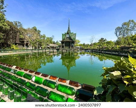 Wat Pa Maha Chedi Kaew or Wat Lan Khuad beer temple or million bottles temple, in Sisaket, Thailand
