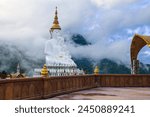 Wat Phra That Pha Son Kaew Picturesque place Surrounded by high mountains The beauty of the pagoda including a white Buddha statue There are 5 statues in a row, creating a beautiful image like heaven.