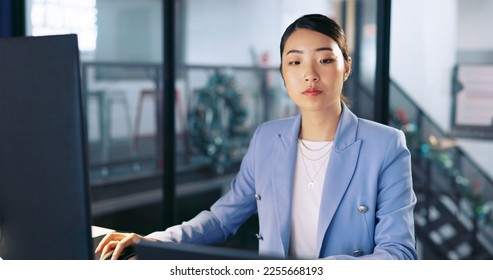 Watch, deadline and computer with a business asian woman working late at night in her office for overtime. Finance, accounting and dedication with a female employee at work in her corporate workplace - Shutterstock ID 2255668193