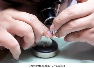 Watch Maker Fixing Watch Movement