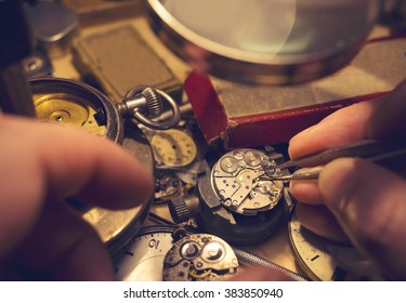 A Watch Maker Repairing A Vintage Automatic Watch.