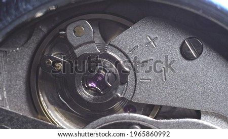 Watch mechanism macro loop. Old vintage clock mechanism working, closeup shot with soft focus. Close up of a internal clock mechanism. Watch gears movement macro. Time Keeping.