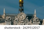 Watch on Historic Bank of Spain building timelapse hyperlapse with monument The Cybele Fountain and Cibeles square between Paseo del Prado and Alcala street with car traffic in Madrid, Spain