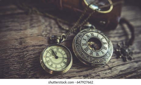 Watch Pendant Necklace On Wooden Table - Shutterstock ID 647927662
