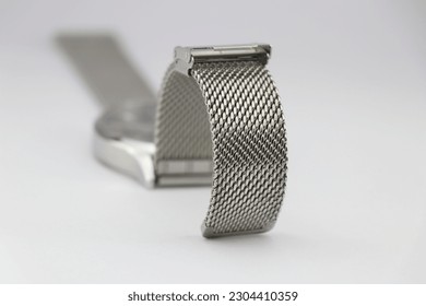 Watch strap made from stainless steel links on a white background - Powered by Shutterstock