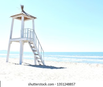 watch tower on empty beach, sunny day