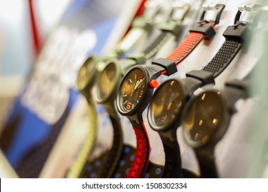 Watch Wrist,market,Counterfeit Watches Available For Sale On The Road Corridor,background Blur,Soft Focus And Selective Focus.