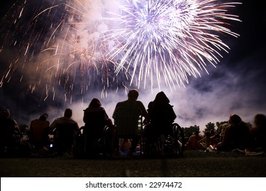 Watching A Fourth Of July Fireworks Display.