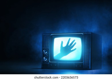 Watching horror movie on tv