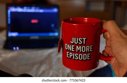 Watching series with a cup of tea. Just one more episode 2 - Shutterstock ID 771067423