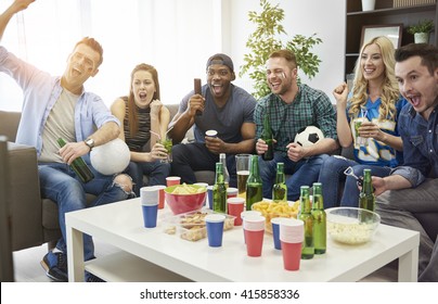 Watching soccer is their common hobby - Powered by Shutterstock