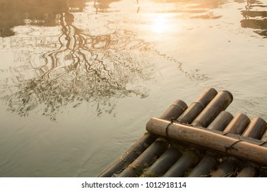 Watching Sunrise On A Wood Raft In Gui Lin China