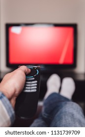 Watching tv and using remote control