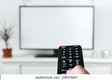 Watching TV And Using Remote Controller