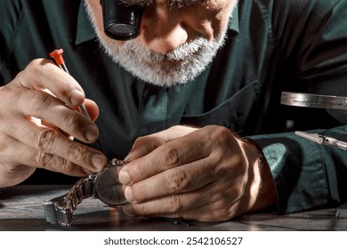 Watchmaker repairing watches looking through magnifying glass monocular. Professional senior watch fixer in repair services workshop - Powered by Shutterstock