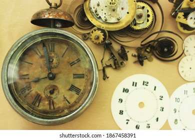 Watchmaker Shop, Old Clocks Details And Mechanisms. Selective Focus On Large Watch.