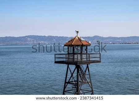 A watchtower on Alcatraz Island, and a view of the water, Alcatraz Federal Penitentiary, Alcatraz Island, San Francisco Bay, California