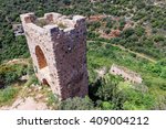 Watchtower, remains of outer walls of castle  Monfort in northern Israel, and the path leading to the castle
