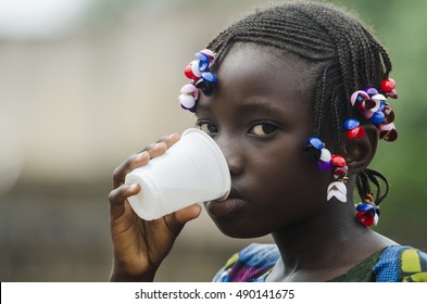 Water For Africa - African Girl Drinking