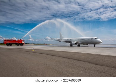Water arch for first visit white passenger airliner at the airport - Shutterstock ID 2209608089