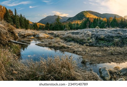 Water in the autumn mountain valley. Autumn mountain water. Autumn mountain landscape. Cold autumn in mountains - Powered by Shutterstock