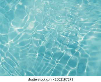 Closeup blur abstract of surface blue water. Abstract of surface blue water reflected with sunlight for background.Top view of blue water. Water splashed abstract background. - Powered by Shutterstock - Get 15% off with code: PIKWIZARD15
