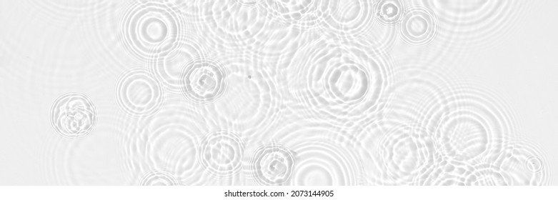 Water background. White transparent water texture, blue mint water surface with rings and ripple. Spa concept background. Flat lay, top view, copy space, copy-space, place for text.