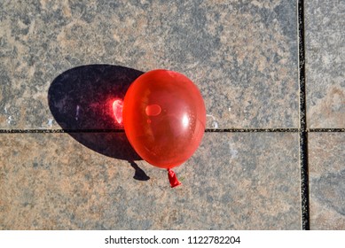 Water Ballon On The Ground.