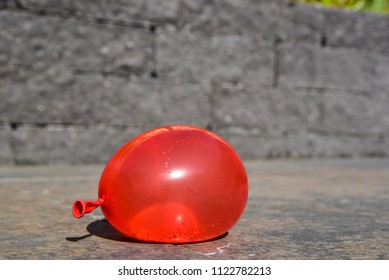 Water Ballon On The Ground.